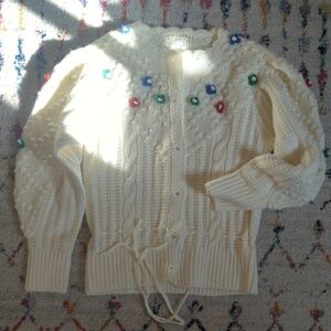 Elegant Cream Cardigan with Floral Details